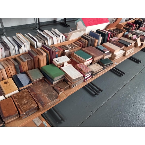 40 - A large collection of mostly leather bound books