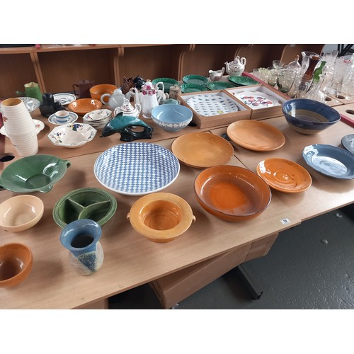 59 - A selection of studio pottery plates, bowels, vases - some signed