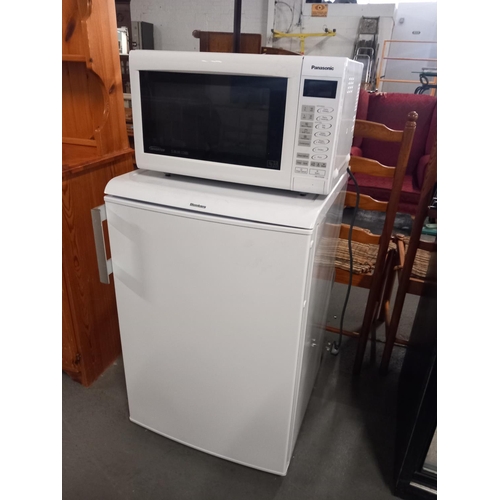 398 - A Blomberg undercounter fridge together with microwave