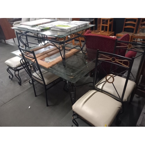 438 - A glass top dining table and five chairs, coffee table and pictures