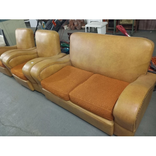 452 - An art deco style suite consisting of a two seater sofa and two armchairs