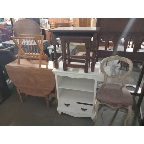 462 - A nest of tables, bedroom chair, drop leaf dining table etc