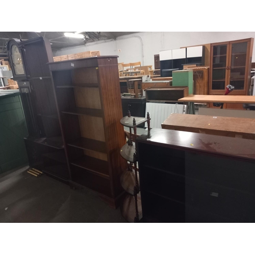 467 - Two mahogany bookcases, two corner cabinets and a long cased clock