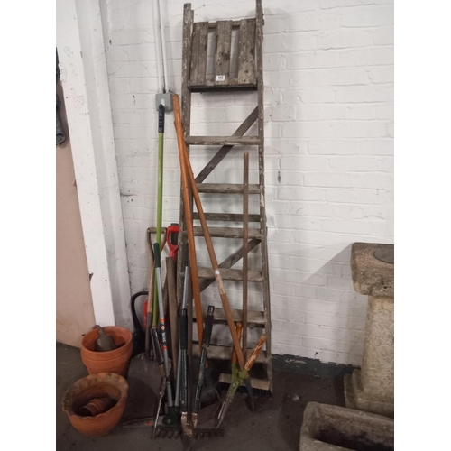 485 - A wooden step ladder, gardening tools, planters etc