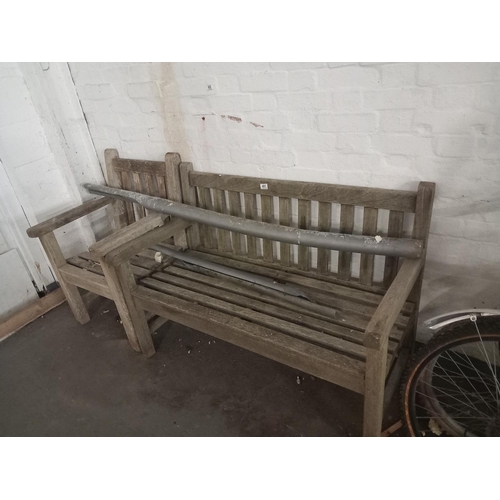 491 - A wooden garden bench and chair