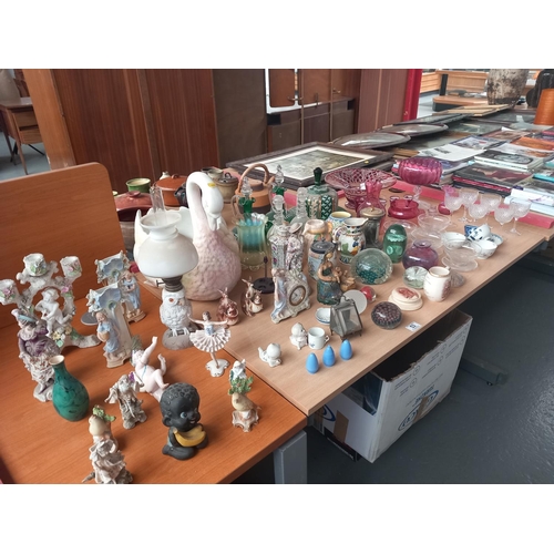 53 - A good collection of early china and glass - figurines to include Dresden, Cranberry glass, paperwei... 