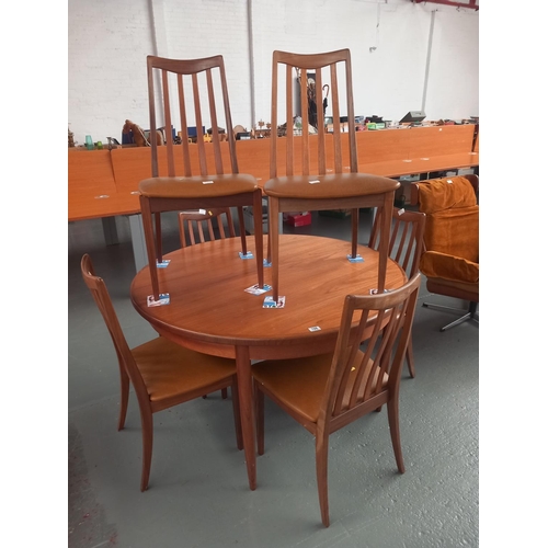 108 - A G Plan circular extending dining table and six chairs