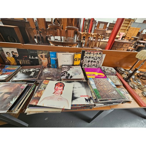 43 - A good collection of vinyl LPs and singles - The Rolling Stones, The Smiths, Roxy Music, David Bowie... 