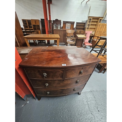 104 - A bow fronted mahogany two over two chest of drawers