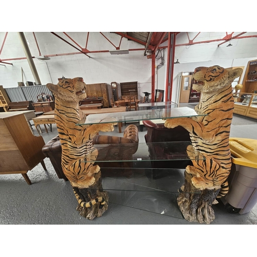 105 - A large pair of tigers holding glass shelves - display/display shelving

Dimensions: 
1.6m tall x 1....