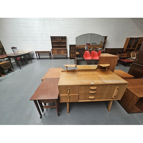 122 - A Mid-Century dressing table together with a teak nest of tables