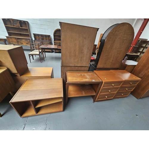 123 - Two teak G Plan dining tables drinks trolley and a record cabinet