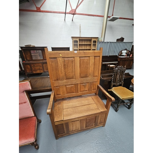 127 - An oak settle