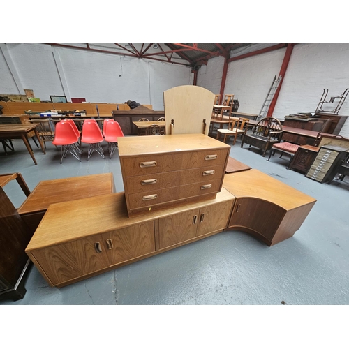 147 - A teak G Plan sideboard, chest of drawers and a corner cabinet