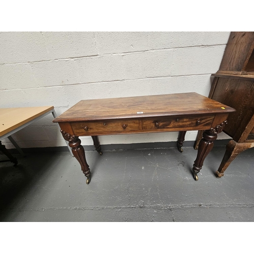 156 - A mahogany two drawer desk