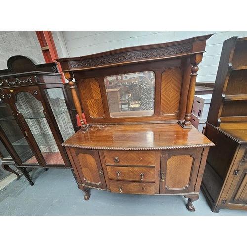 166 - A mirrored back sideboard