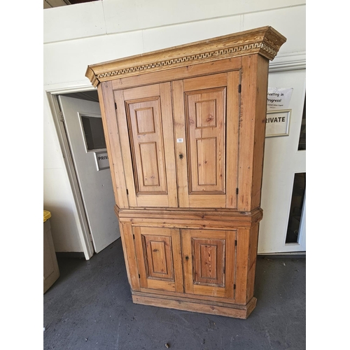 183 - A pine corner cabinet