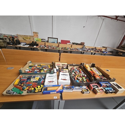 67 - Boxed model cars and playworn cars