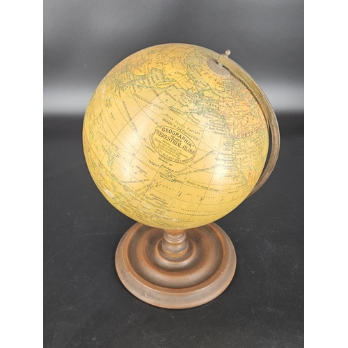 204 - A Geographia 10 inch terrestrial globe on wooden stand