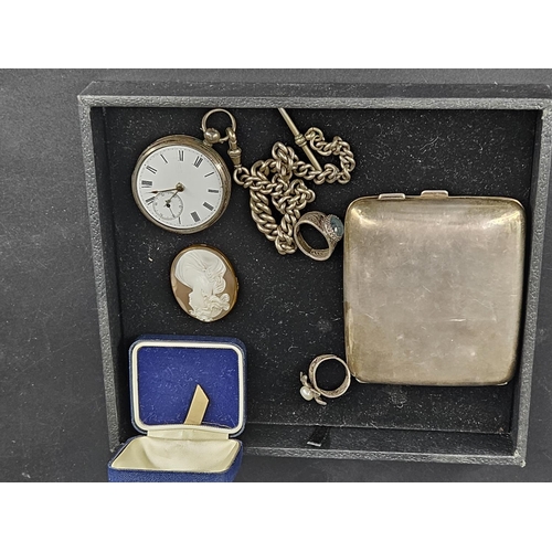 207 - A silver cigarette case, a silver pocket watch and silver watch chain (glass missing) and two silver... 