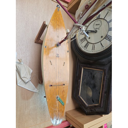 21 - A vintage pond yacht and an Ansonia drop dial wall clock