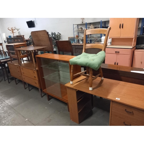 361 - A teak dressing table, chest of drawers, magazine rack, pine effect desk, etc