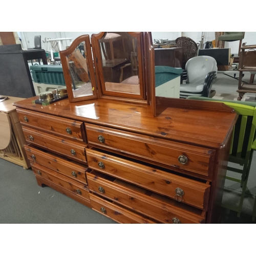 377 - A pine double chest of drawers together with a dressing table mirror