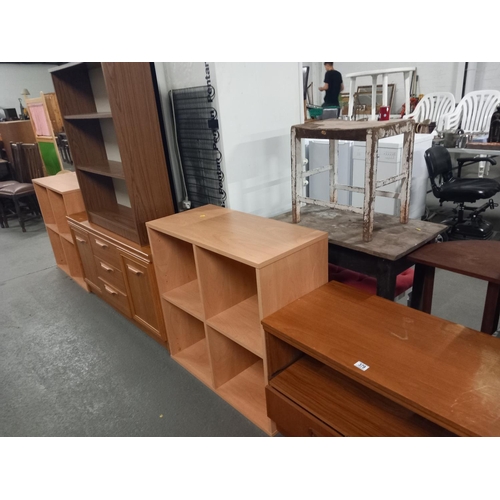 379 - A sideboard, two small pidgeon hole bookcases, teak cabinet and one other bookcase