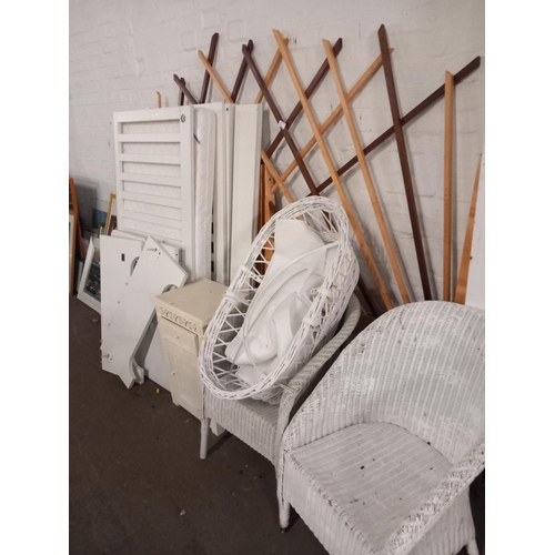 473 - Two wicker chairs, child's cot, bedside cabinet, etc