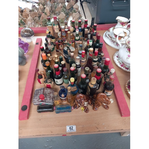 62 - A collection of alcohol minatures