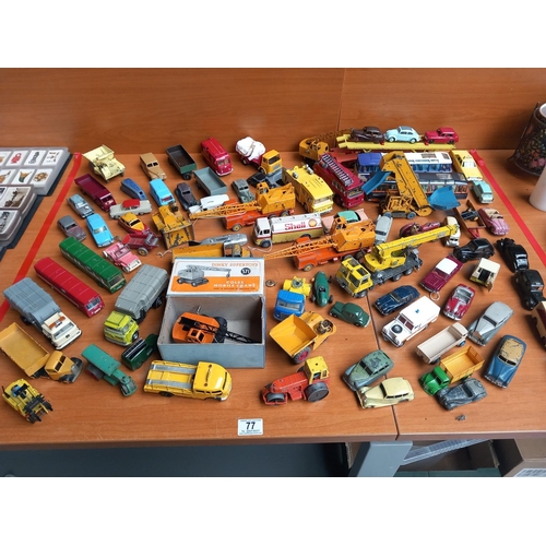 77 - A collection of playworn diecast model vehicles - majority being Dinky