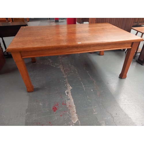 117 - A large oak dining table