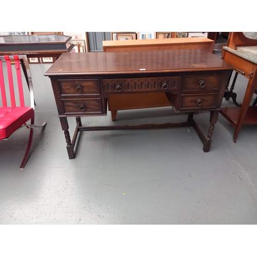 121 - An oak twin pedestal desk