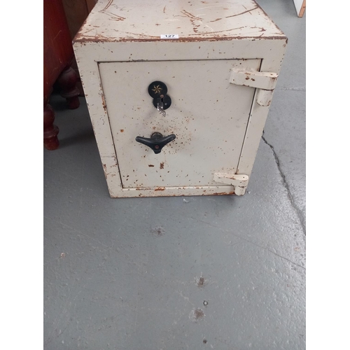 127 - A small cast iron fireproof safe with key