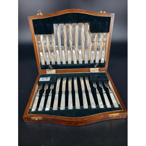 219 - A cased set of twelve silver and mother of pearl fruit knives and forks - Hallmarks for Sheffield 19... 