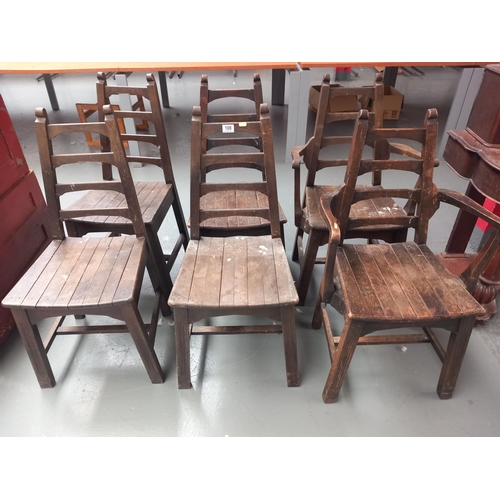 108 - Six oak framed dining chairs to include two carvers