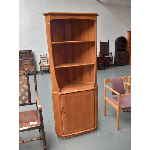 117 - An ercol corner cabinet