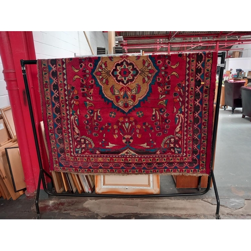 136 - A hand knotted persian carpet