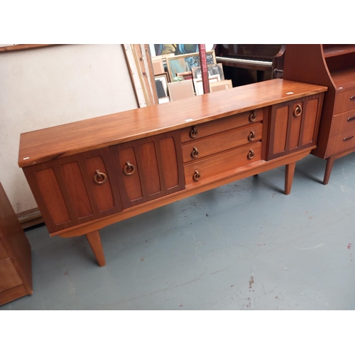 138 - A teak mid century sideboard