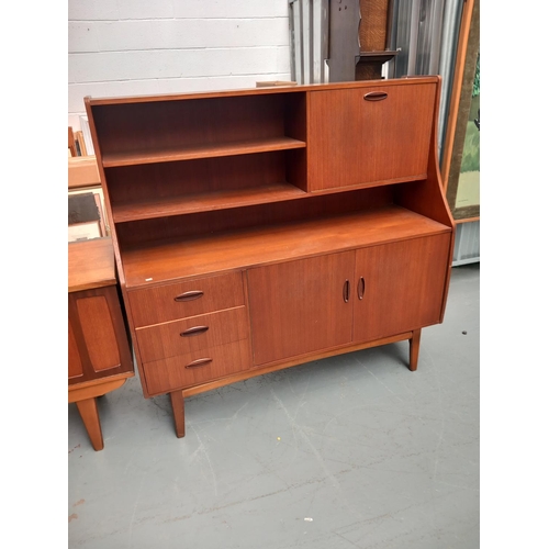 139 - A teak highboard