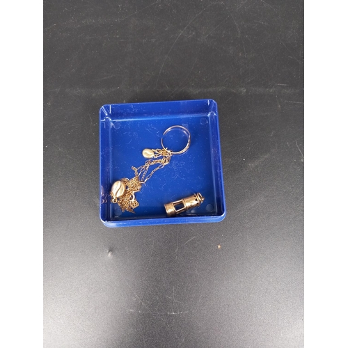 214 - A 9k gold miners lamp charm, bracelet, pendant and scrap gold (combined weight 4.36 grams)