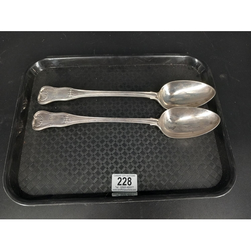 228 - Two very large hallmarked silver serving spoons - Kings pattern (12 inches in length) - London - Wil... 