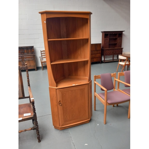 113 - An ercol corner cabinet