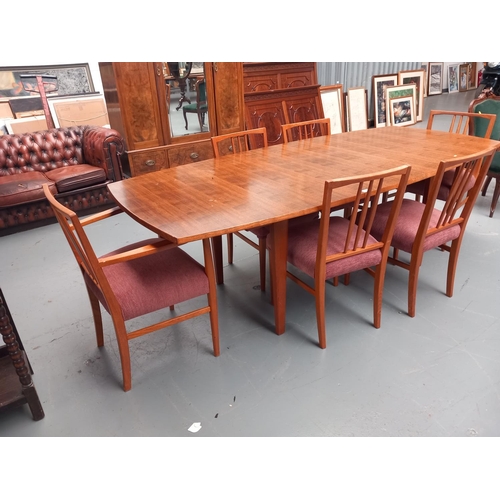 119 - An extending dining table and six chairs