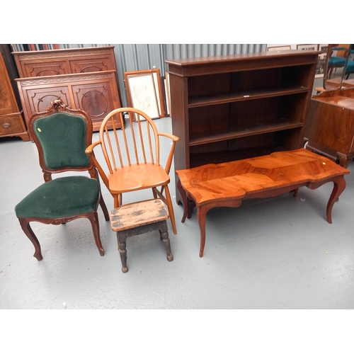 120 - An oak bookcase, coffee table, hall chair, armchair etc