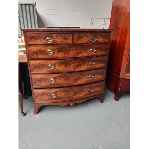 122 - A Georgian mahogany bow fronted two over four chest of drawers