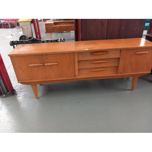 127 - A teak sideboard