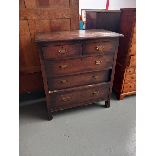 129 - An oak two over three chest of drawers