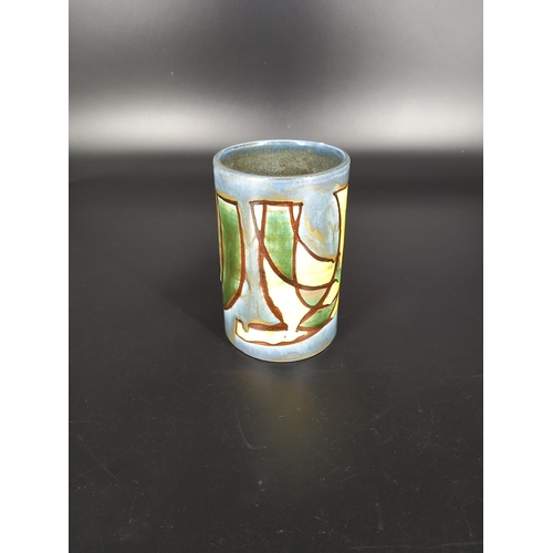 200 - A Poole pottery cylindrical vase (6 inches tall)