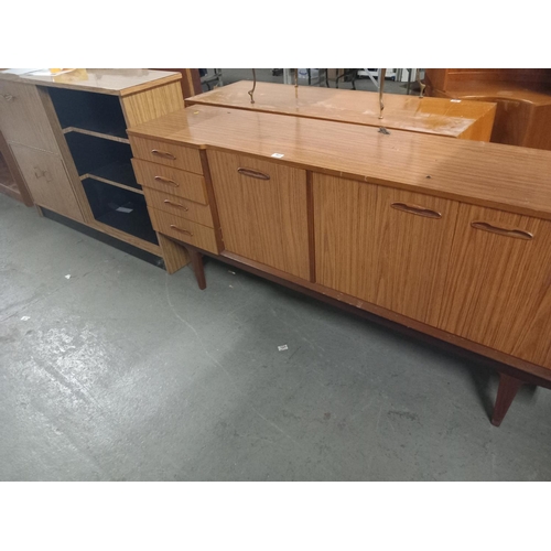 563 - A sideboard and a bookcase